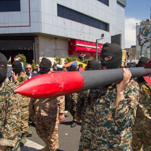 Iranians attend the funeral procession for seven Islamic Revolutionary Guard Corps members killed in a strike in Syria, which Iran blamed on Israel, in Tehran on April 5, 2024. 